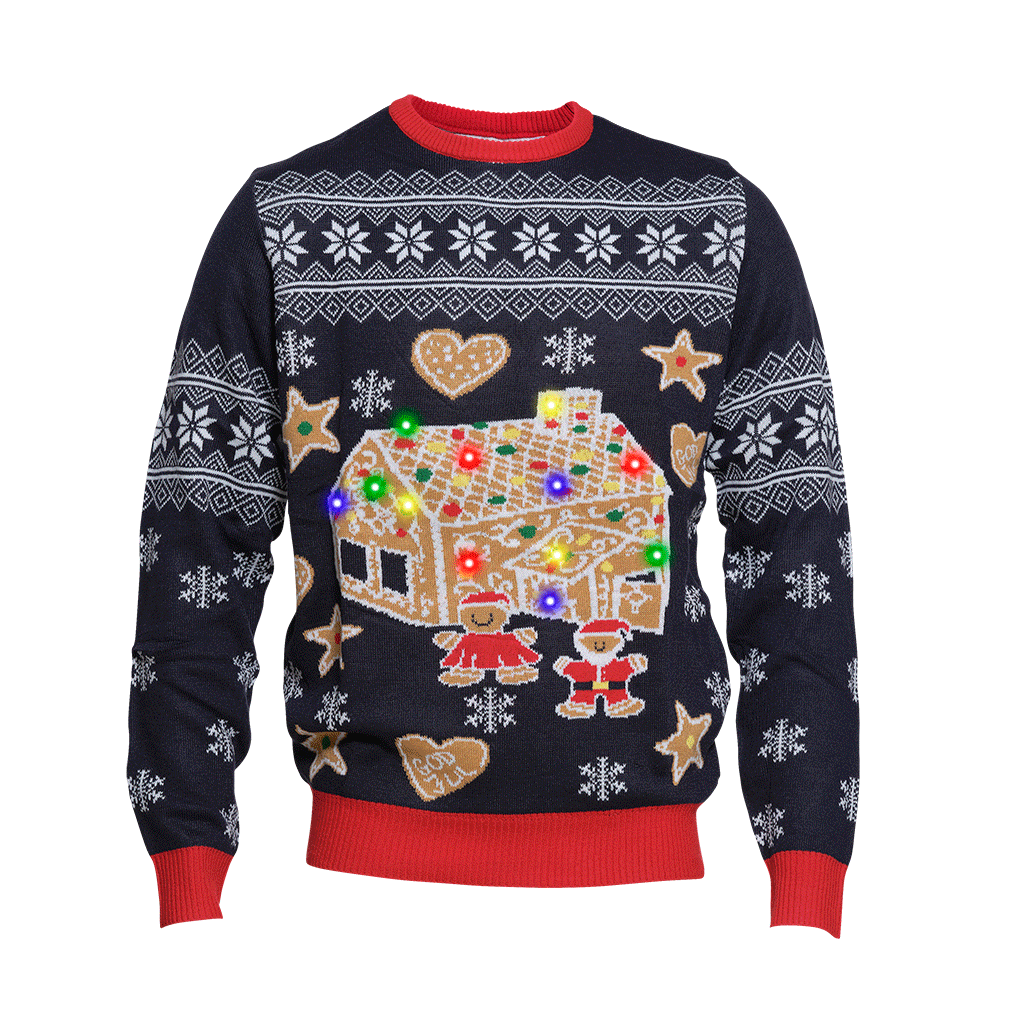 En julesweater med hvidt mønster på og et kagehus med lys, der blinker i forskellige farver.
